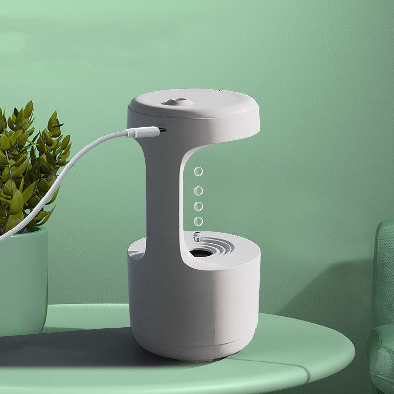Elevate Your Space: Large Capacity Anti-Gravity Humidifier & Aroma Diffuser with Clock - Perfect for Bedroom & Office!